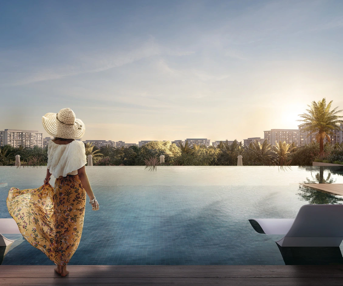 Elvira Building - Dubai Hills Estate - Woman Standing by an Infinity Swimming Pool